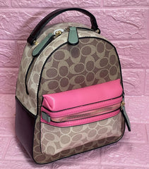 Bolso de dama Mini Morral Coach color a elección