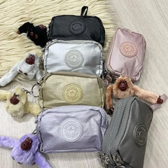 Monedero Kipling con llavero 3 cierres color a elección