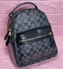 Bolso de dama Mini Morral Coach color a elección