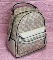 Bolso de dama Mini Morral Coach color a elección