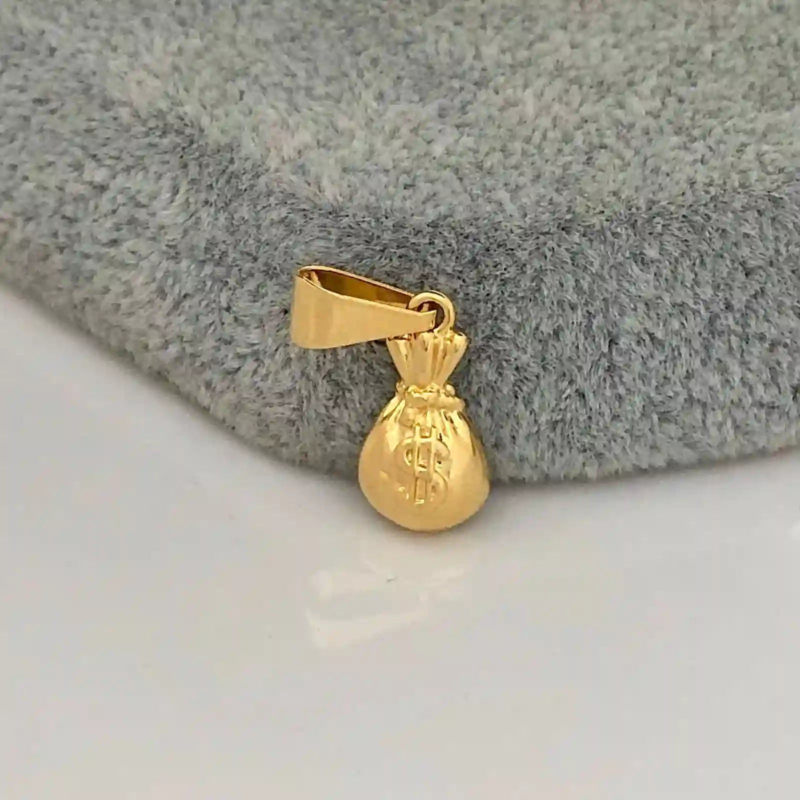 Dije oro laminado 18K Bolsa de dinero 2cm Ref 23122